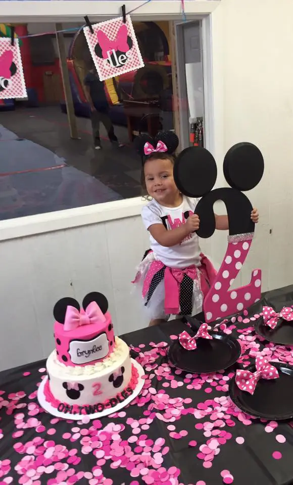 Birthday girl with cake at private kids party venue Waco TX